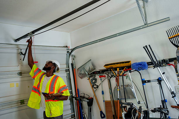 Professional Garage Door Panel Replacement technician working in Taos, NM